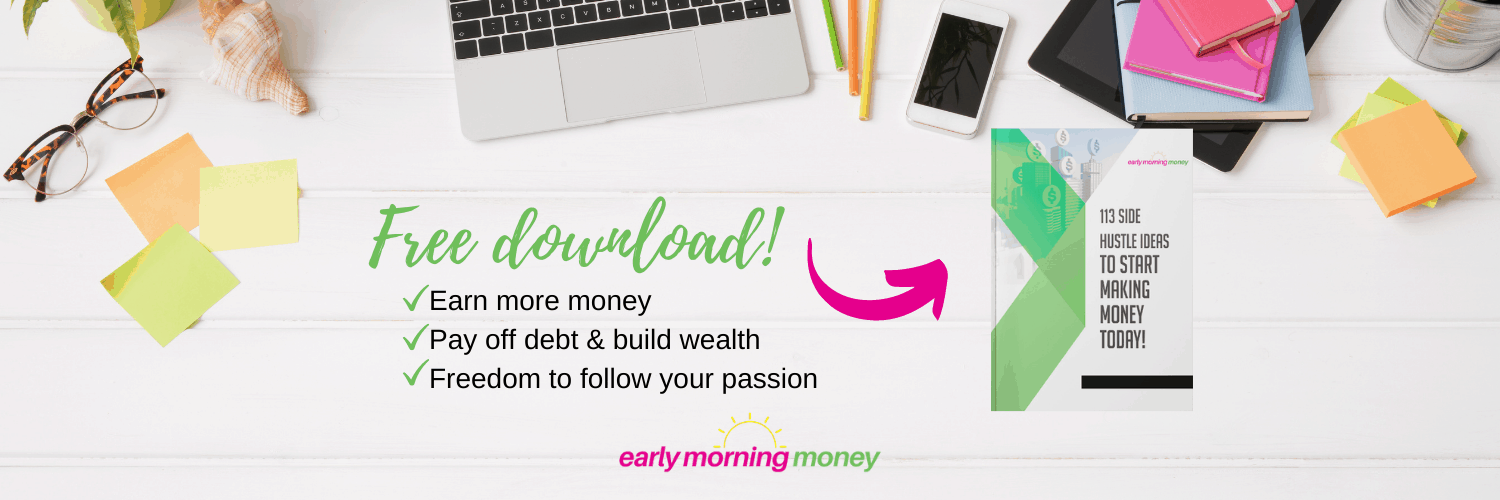 A clean and organized desk workspace with a laptop, mobile phone, colorful note pads, and pens on one side, and an advertisement banner on the other advocating financial independence with phrases like 